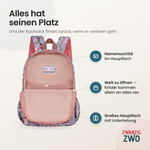 Kinderrucksack dusty rose – geöffnetes Hauptfach mit Namensschild und Unterteilung
