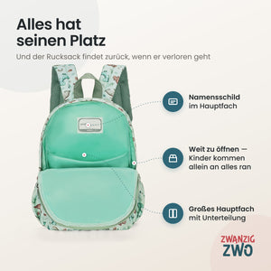 Kinderrucksack kleine Dinos – geöffnetes Hauptfach mit Namensschild und Unterteilung